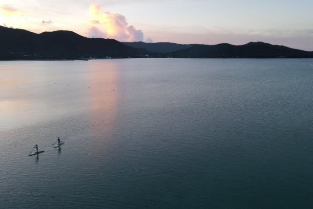 奄美大島【サンセットSUP】サップ初心者の方でも大歓迎！当日予約可能・ドローン空撮動画で撮影する写真の無料プレゼントあり※お一人様も可能